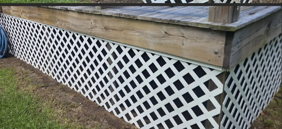 White lattice under a deck after cleaning